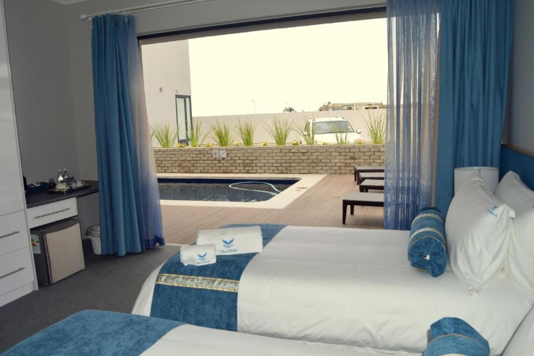 Blue Whale Hotels Уолфиш Бей Екстериор снимка